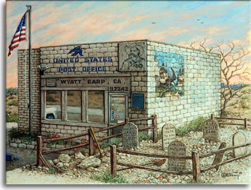 The squat block building of the Post Office in Earp, California, sits in front of the beginning of a sunset, the light blue sky painted with wispy orange clouds. A Boot Hill style graveyard next to the building is fenced off by a split rail fence on the rocky ground. The front window reflect the parking lot and the front of a white truck. The side wall of the post office has a fading outdoor mural in the upper left corner. A drawing of Wyatt Earp is attached to the front of the building next to the official blue sign with the eagle USPS logo. Small scrub bushes dot the landscape around the building.